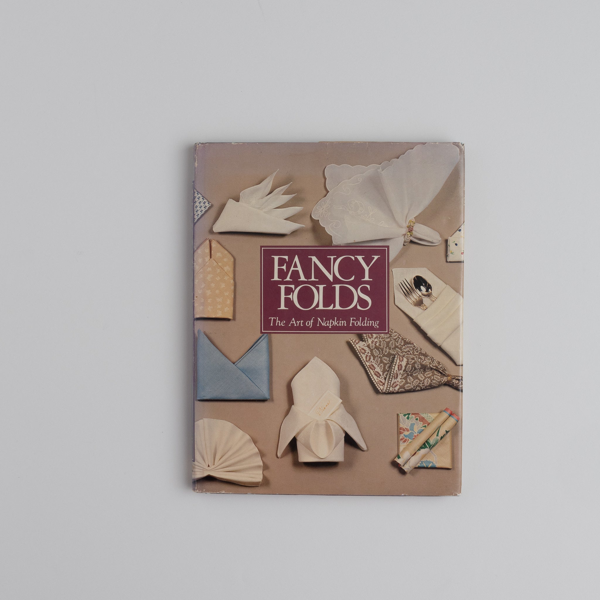 Fancy Folds: The Art of Napkin Folding Book by Linda Helzer - Homekeep Market